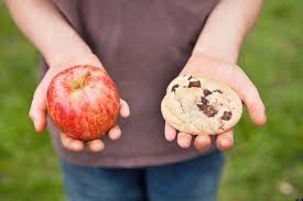 cookie and apple in hand